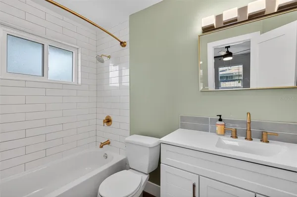 a bathroom with a sink and a bathtub