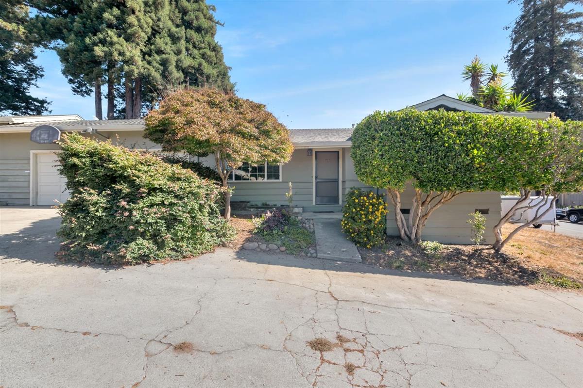 406 Pine Street, Unit A Capitola, CA 95010 - Photo 2 of 32 a backyard of a house with lots of green space