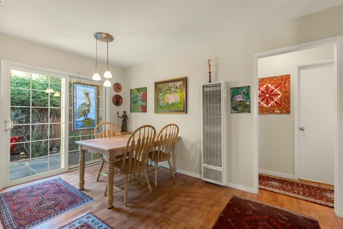 406 Pine Street, Unit A Capitola, CA 95010 - Photo 11 of 32 a dining room with furniture and window