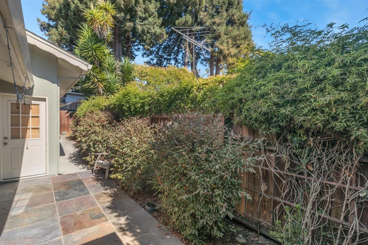 406 Pine Street, Unit A Capitola, CA 95010 - Photo 6 of 32 a view of a pathway both side of the house