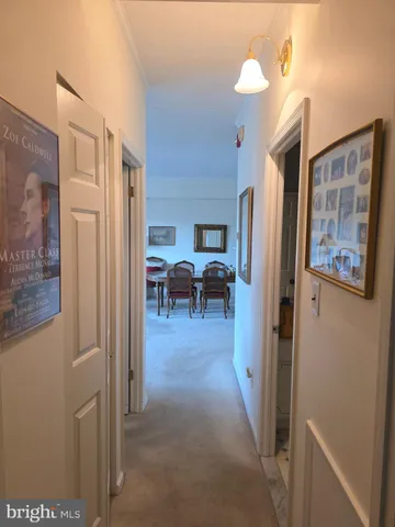 a view of a livingroom with furniture and workspace