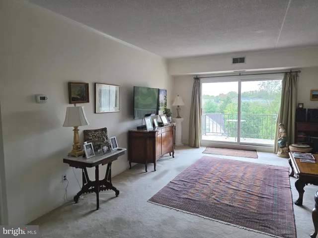 a bedroom with a workspace