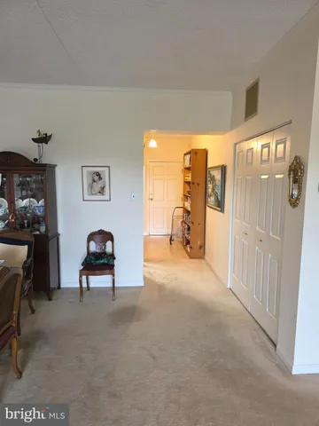 a view of a livingroom with furniture and a livingroom