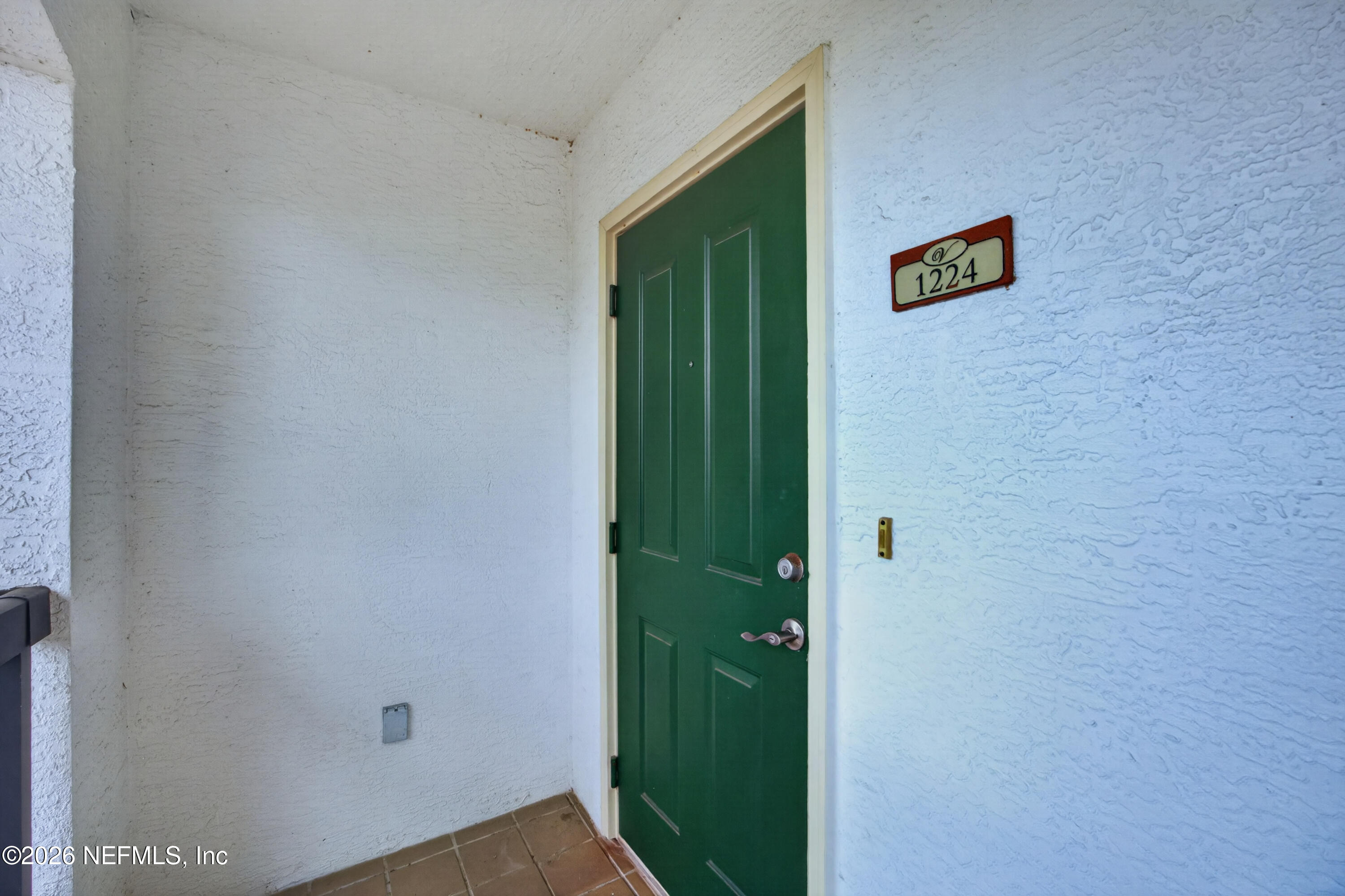 9745 Touchton Road, Unit 1224 Jacksonville, FL 32246 - Photo 3 of 22 a view of a hallway