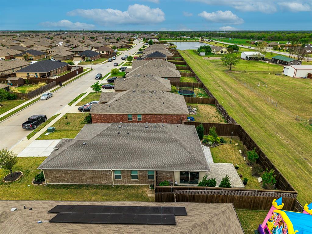 910 Community Way Royse City, TX 75189 - Photo 20 of 27 an aerial view of a house with a garden