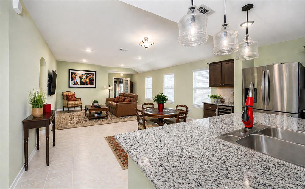 910 Community Way Royse City, TX 75189 - Photo 8 of 27 a living room with furniture and a flat screen tv