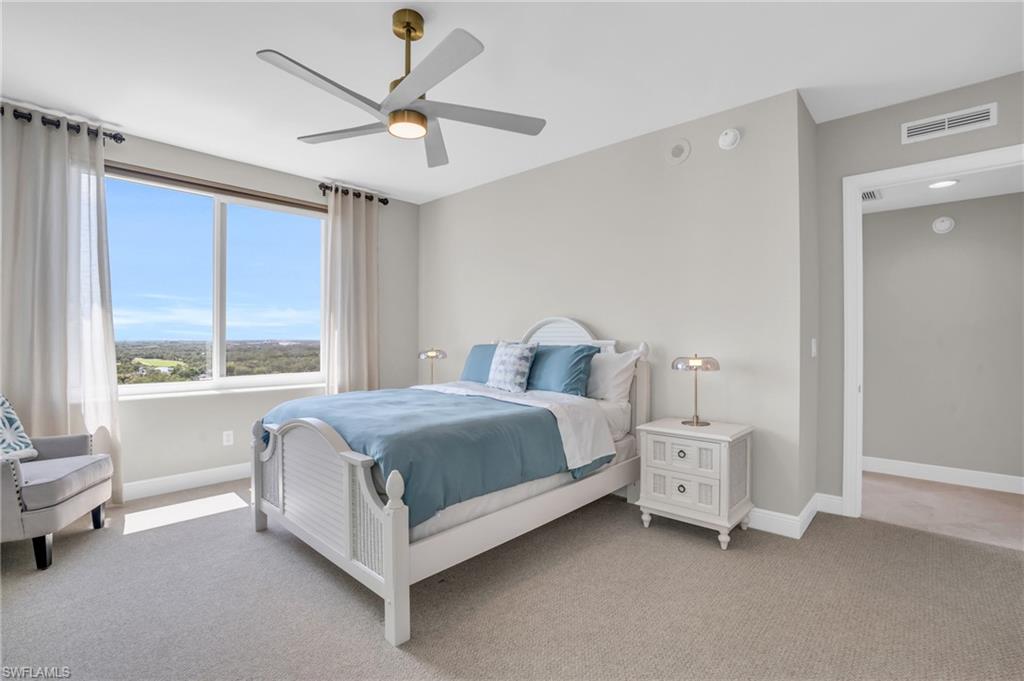 265 Indies Way, Unit 1402 Naples, FL 34110 - Photo 34 of 45 Carpeted bedroom featuring ceiling fan