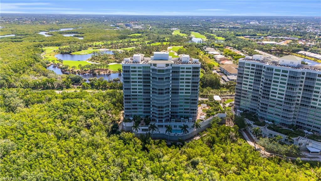 265 Indies Way, Unit 1402 Naples, FL 34110 - Photo 43 of 45 Drone / aerial view featuring a water view