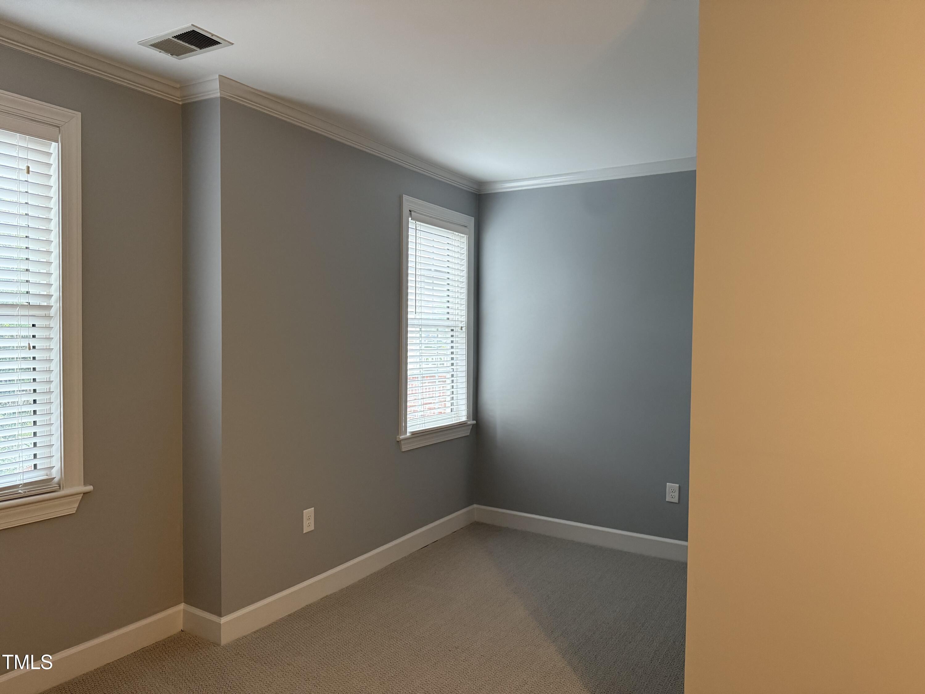 108-201 Northbrook Drive Raleigh, NC 27609 - Photo 32 of 32 a view of an empty room with a window