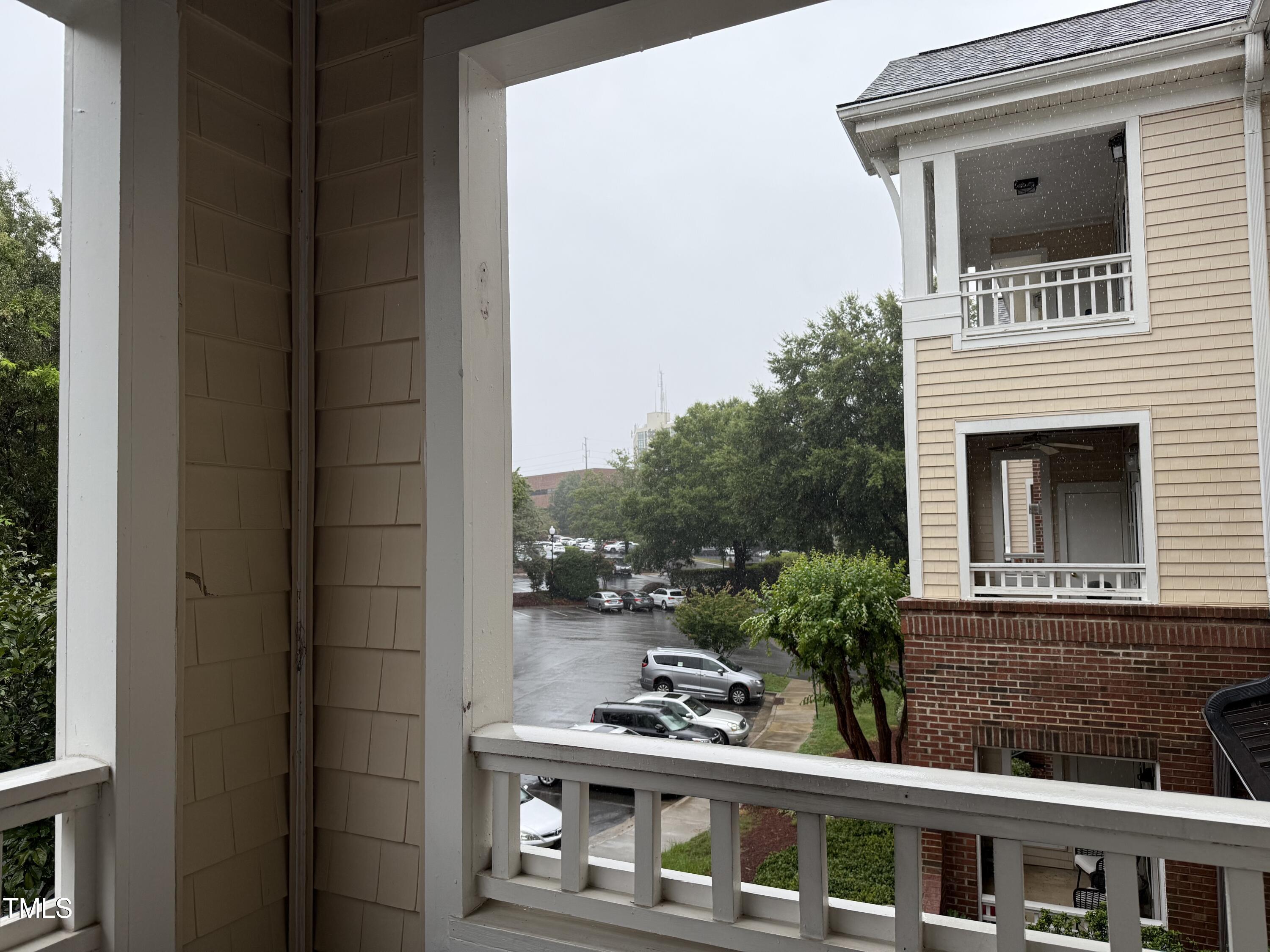 108-201 Northbrook Drive Raleigh, NC 27609 - Photo 5 of 32 a view of building with balcony