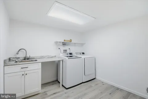 a backyard of a house with outdoor seating