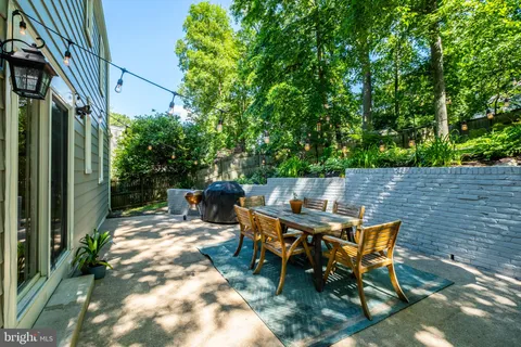 a view of swimming pool with chairs