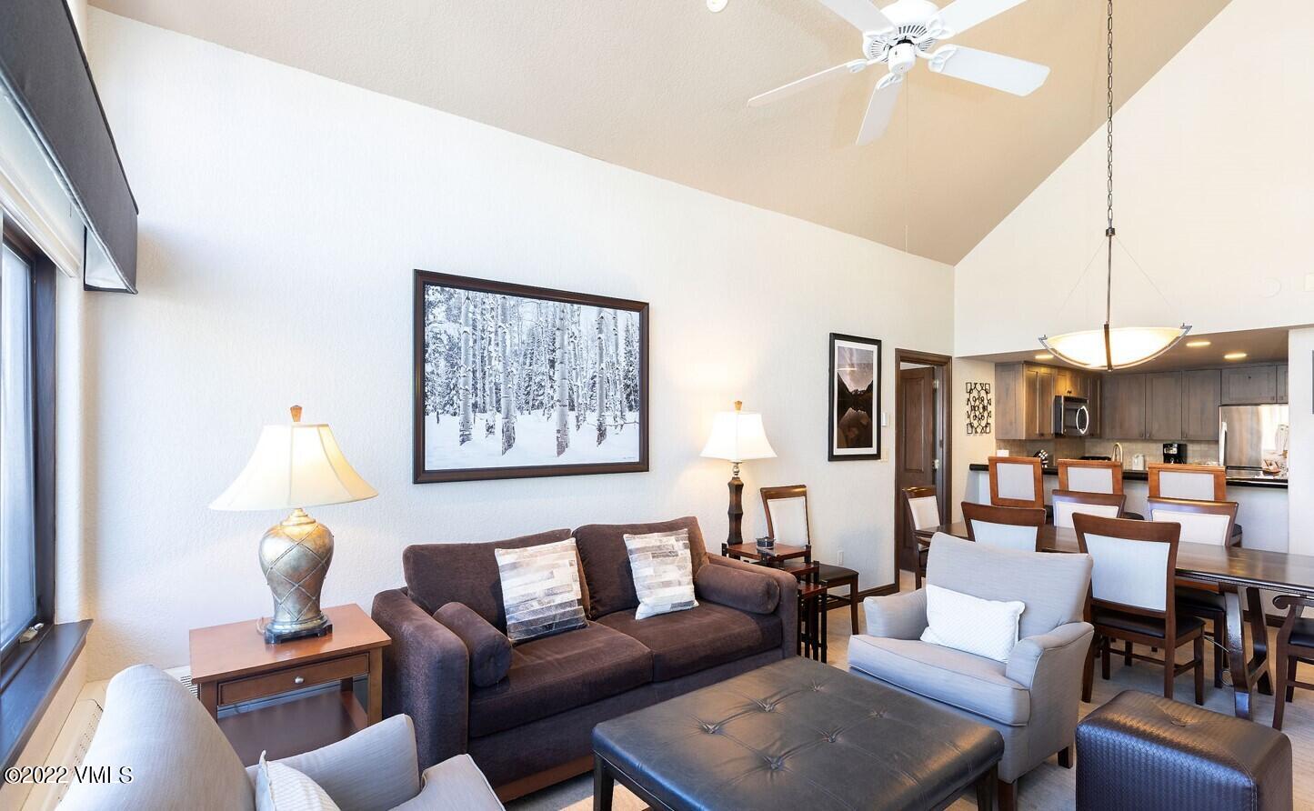 210 Offerson Road, Unit R421 / WEEK 47 Beaver Creek, CO 81620 - Photo 15 of 20 a living room with furniture a lamp and a chandelier