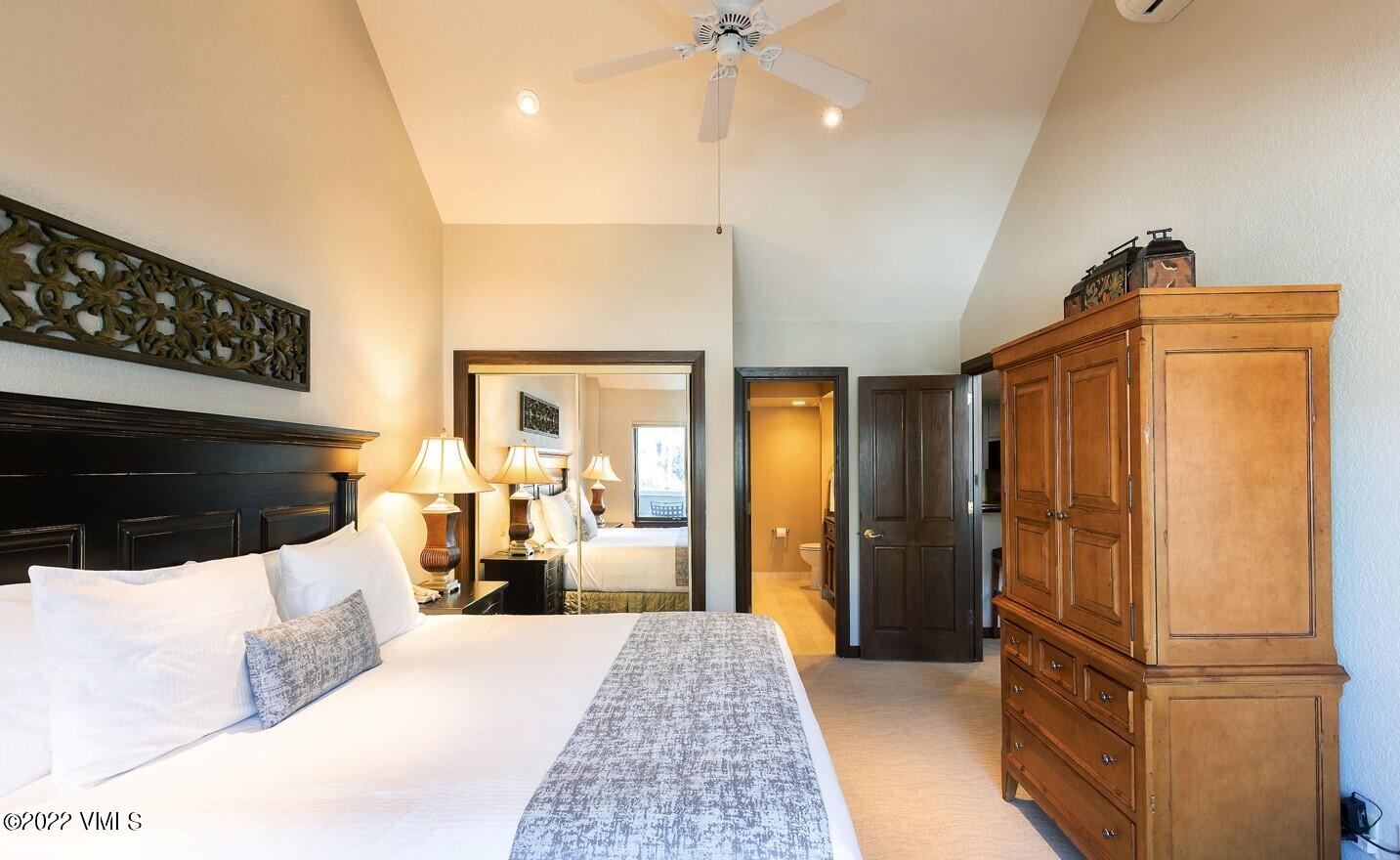 210 Offerson Road, Unit R421 / WEEK 47 Beaver Creek, CO 81620 - Photo 19 of 20 a large bedroom with a bed and a walk in closet