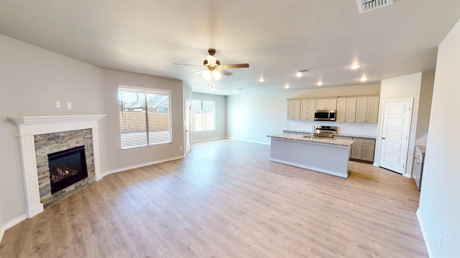 5804 Waverly Lubbock, TX 79407 - Photo 11 of 26 a view of kitchen with cabinets and wooden floor