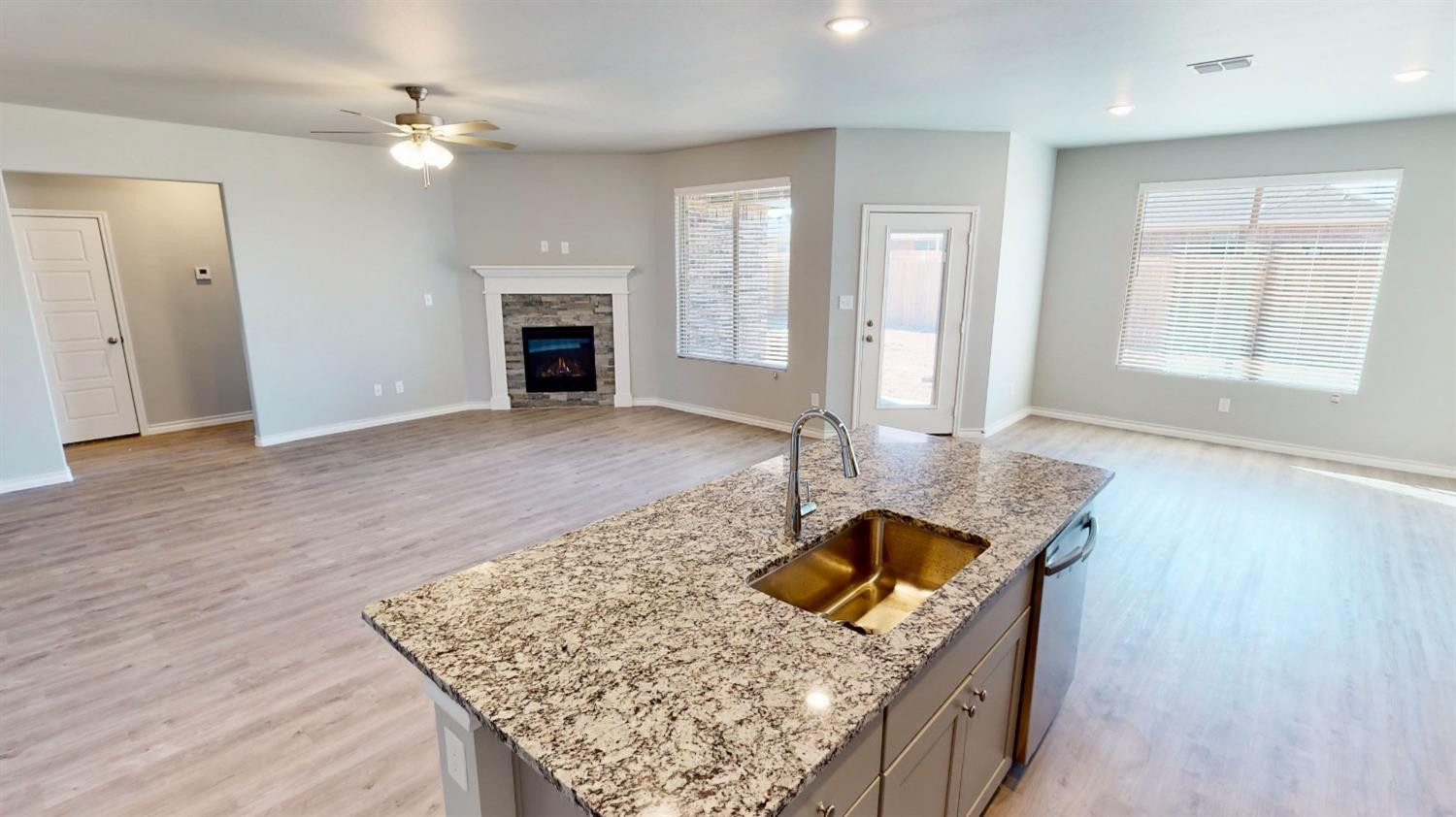 5804 Waverly Lubbock, TX 79407 - Photo 16 of 26 a living room with furniture and a fireplace