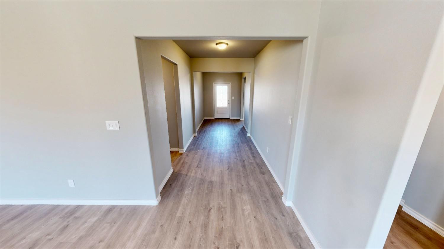 5804 Waverly Lubbock, TX 79407 - Photo 24 of 26 a view of a hallway with wooden floor
