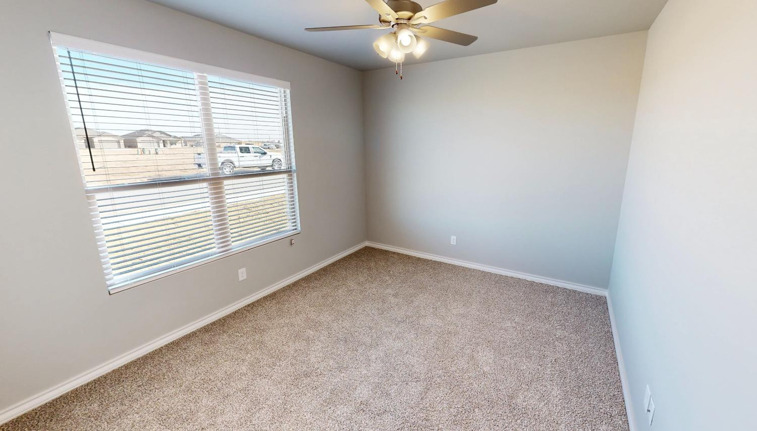 5804 Waverly Lubbock, TX 79407 - Photo 7 of 26 an empty room with a window