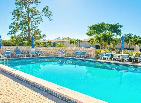 a view of swimming pool from a balcony
