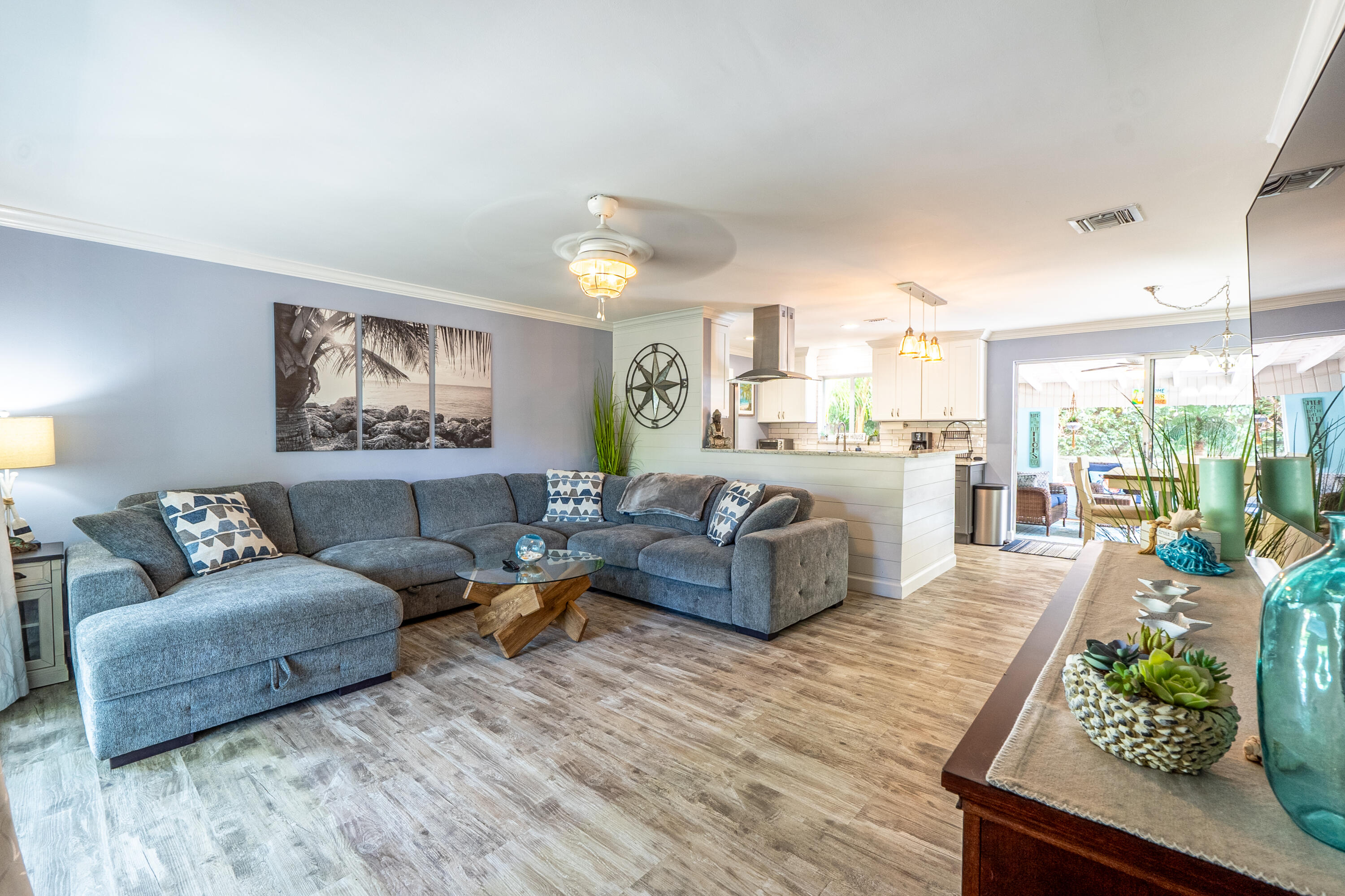 400 Pittsburgh Drive Jupiter, FL 33458 - Photo 2 of 30 a living room with furniture and a large window