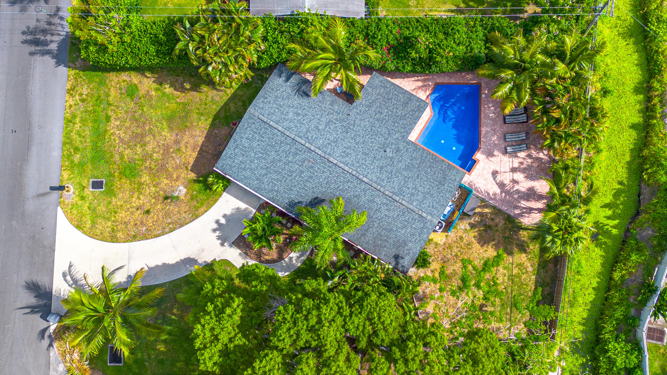 400 Pittsburgh Drive Jupiter, FL 33458 - Photo 30 of 30 an aerial view of a house with swimming pool and garden