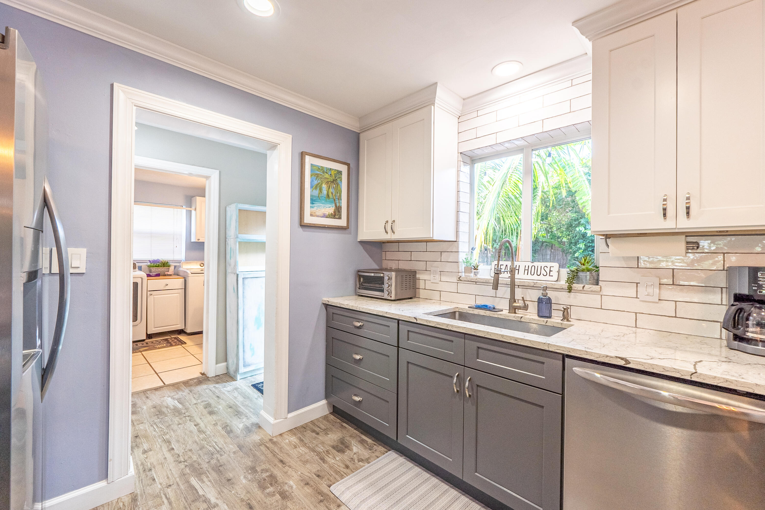 400 Pittsburgh Drive Jupiter, FL 33458 - Photo 9 of 30 a kitchen with a sink and a window