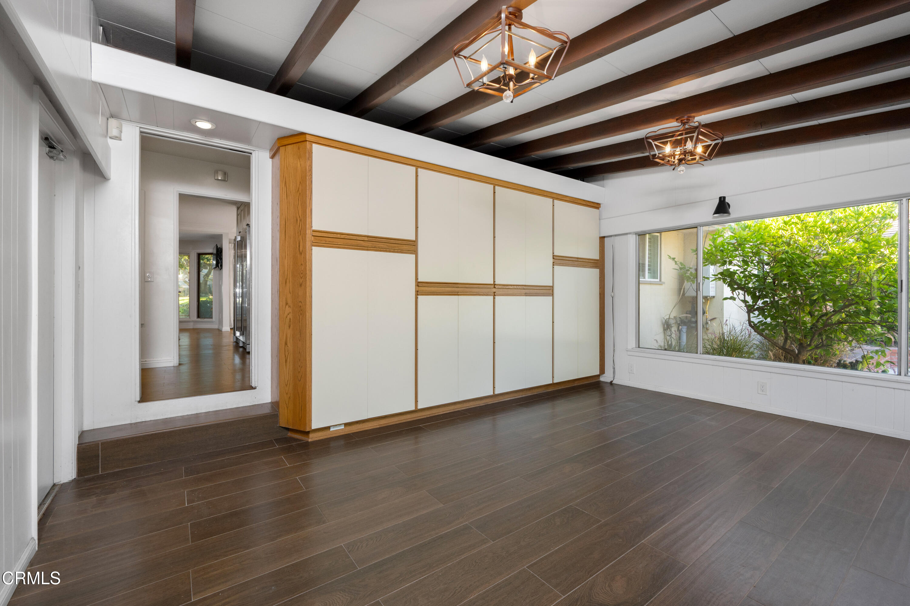 1626 Rodeo Road Arcadia, CA 91006 - Photo 13 of 25 a view of a livingroom with wooden floor and a ceiling fan
