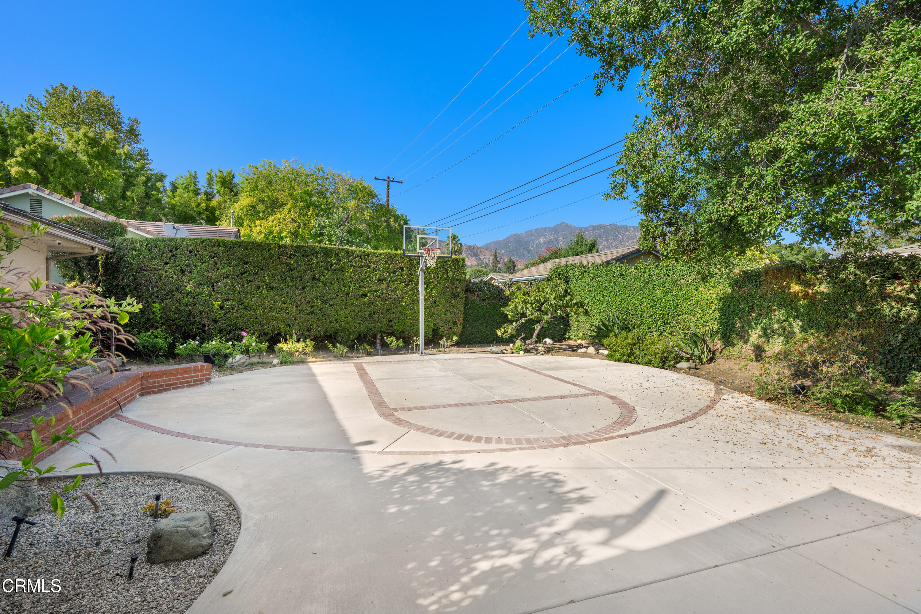 1626 Rodeo Road Arcadia, CA 91006 - Photo 14 of 25 a backyard of a house with lots of green space