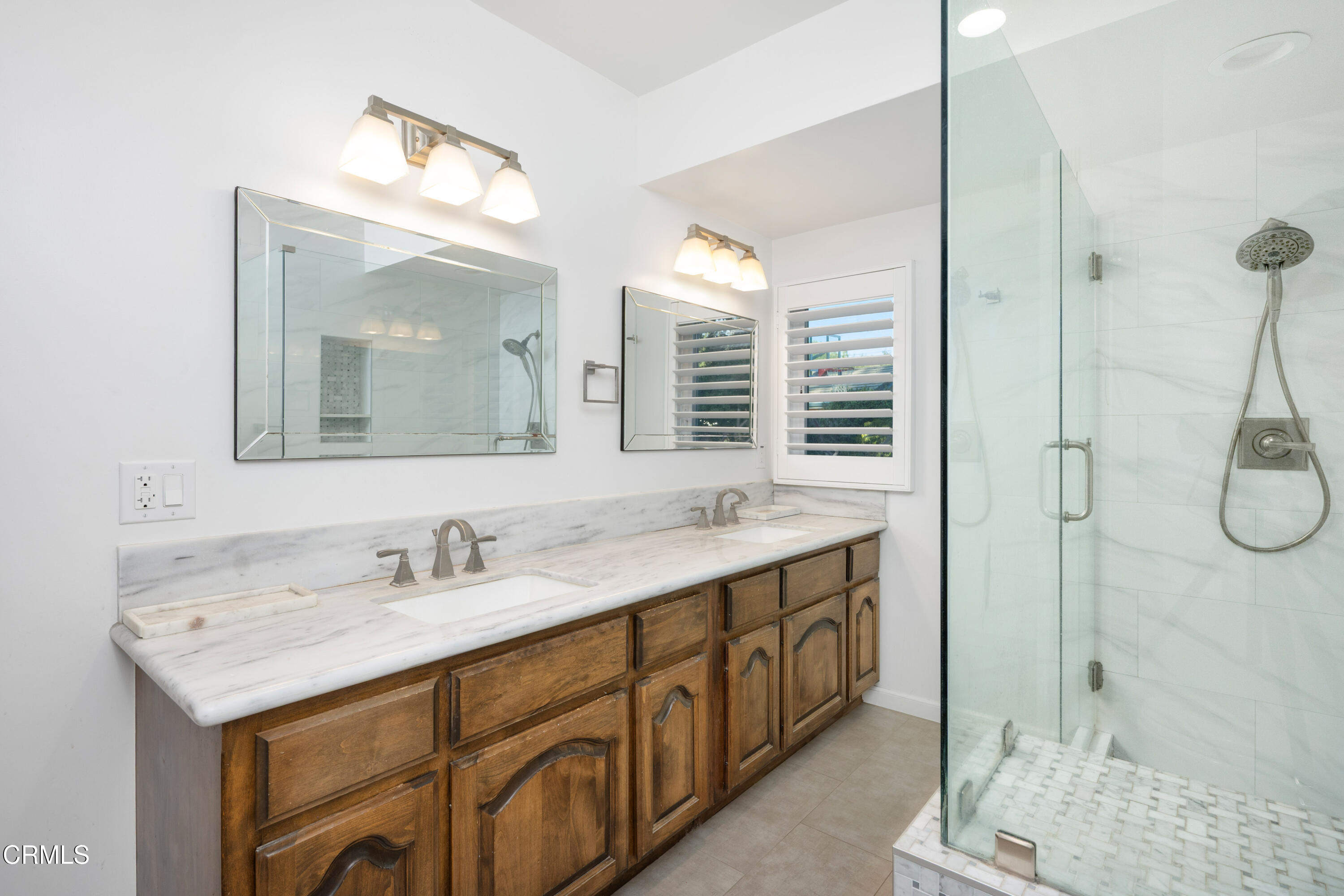 1626 Rodeo Road Arcadia, CA 91006 - Photo 16 of 25 a bathroom with a double vanity sink mirror and shower