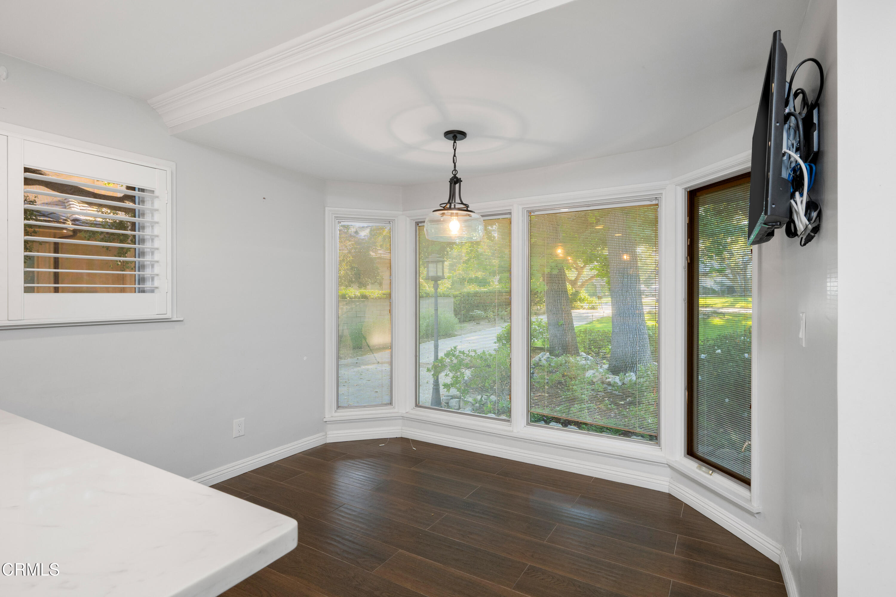 1626 Rodeo Road Arcadia, CA 91006 - Photo 6 of 25 a view of an entryway with wooden floor and windows