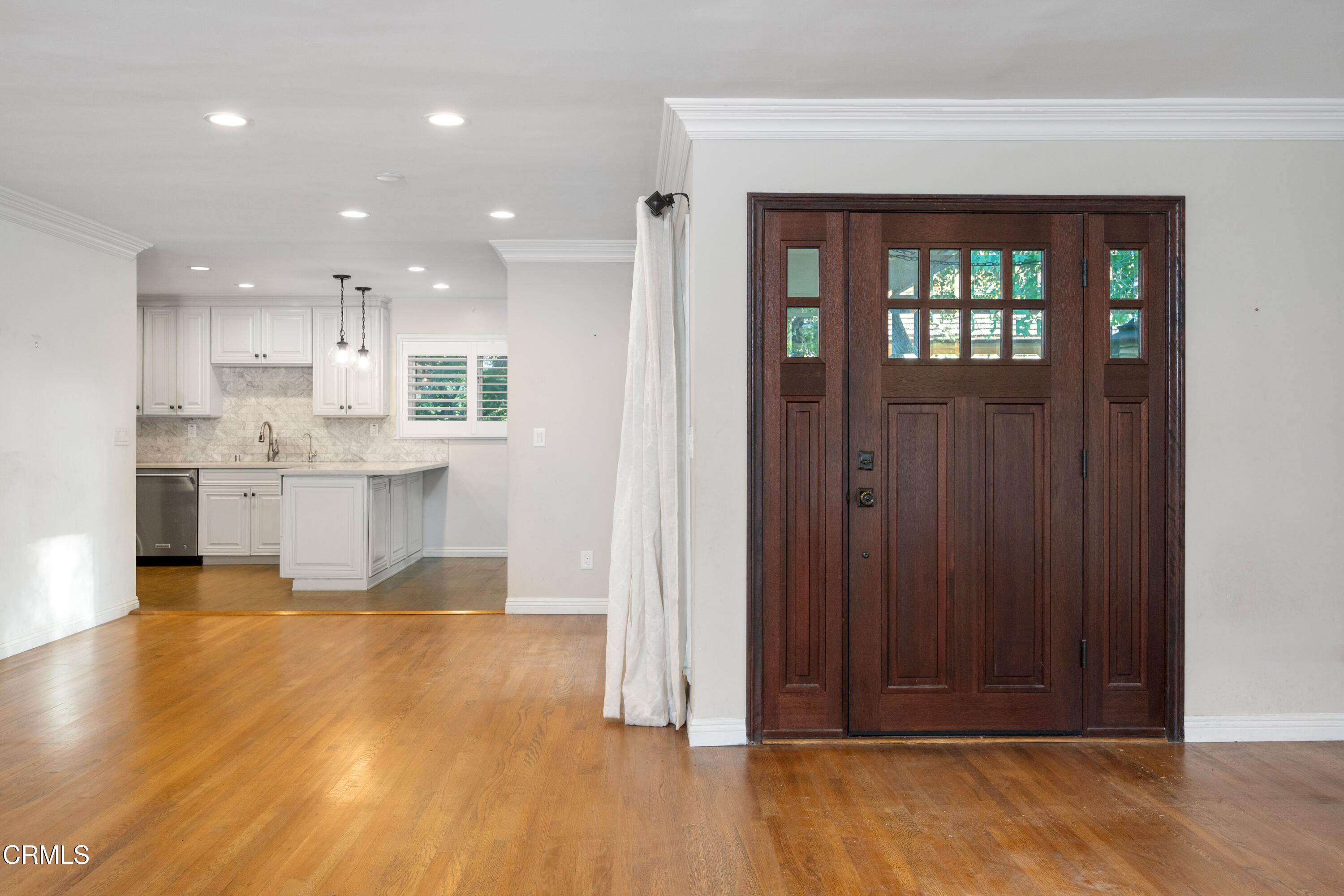 1626 Rodeo Road Arcadia, CA 91006 - Photo 7 of 25 a view of kitchen with wooden floor and a window