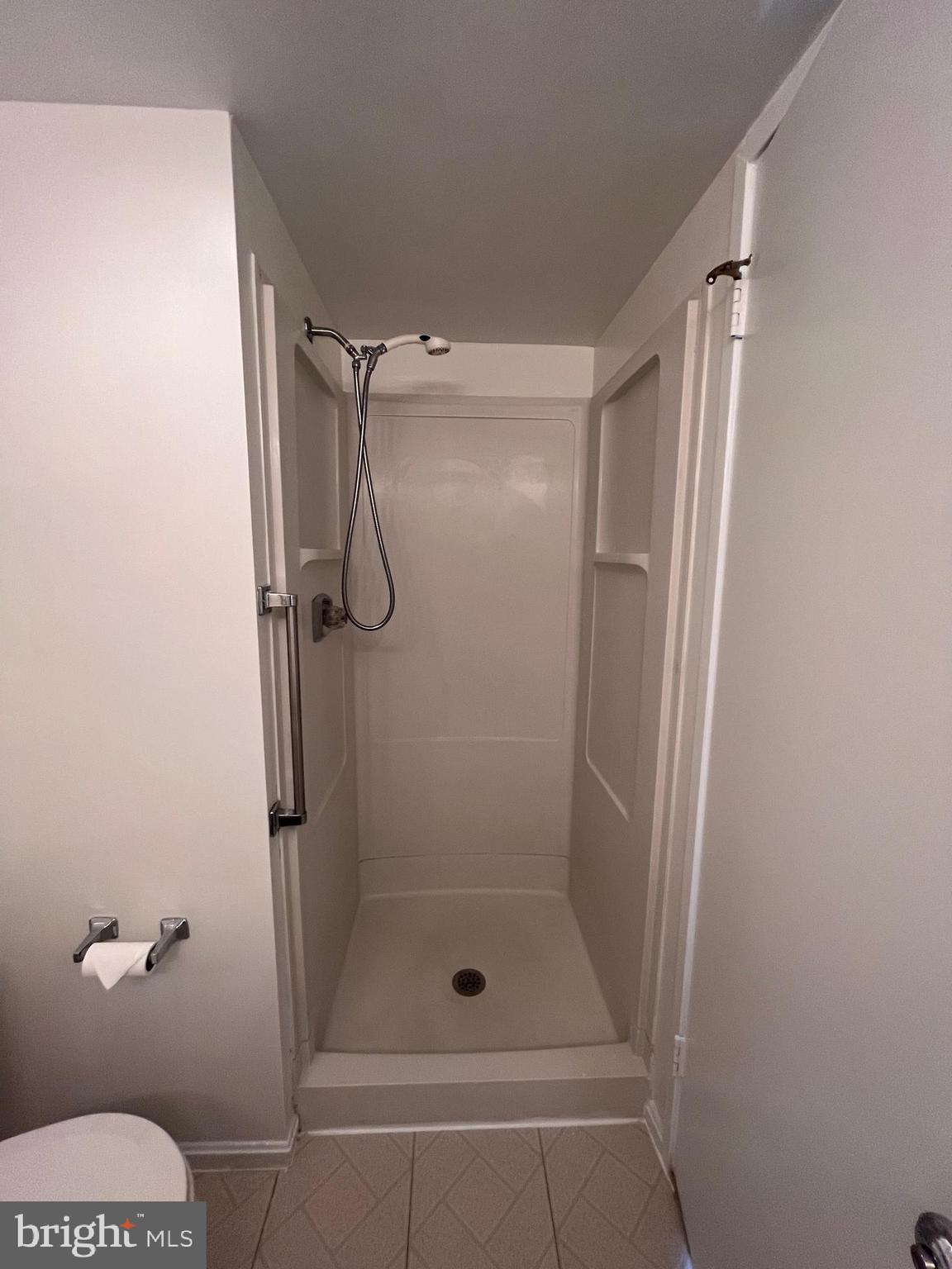 15100 Interlachen Drive, Unit 815 Silver Spring, MD 20906 - Photo 17 of 26 Step in shower stall