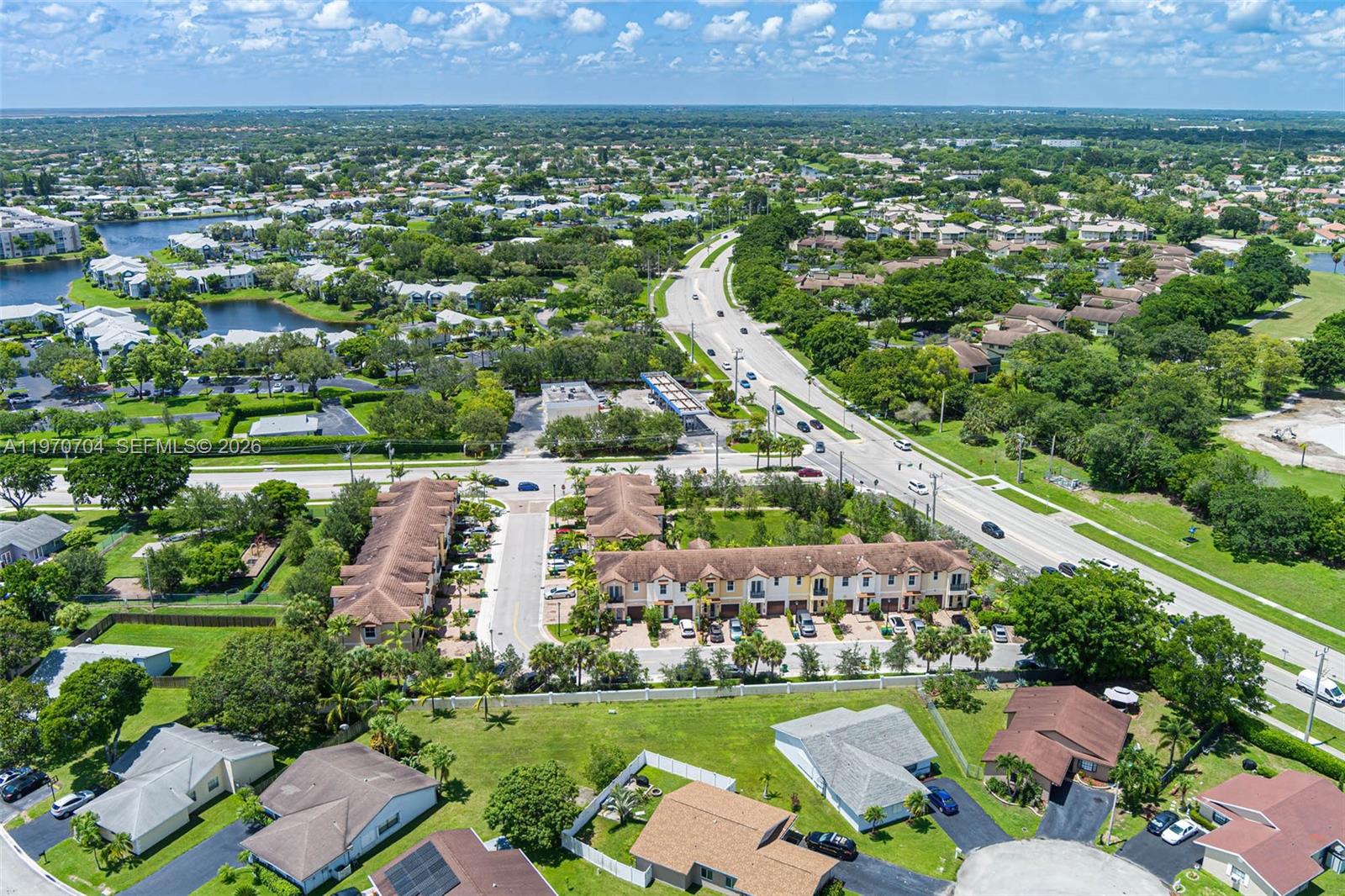 7651 North Pine Island Road Tamarac, FL 33321 - Photo 9 of 9 an aerial view of a house with a garden