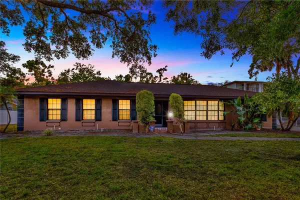 front view of a house with a big yard