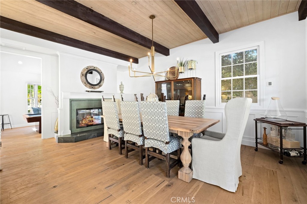 4 Percheron Coto de Caza, CA 92679 - Photo 13 of 44 a view of a dining room with furniture window and wooden floor