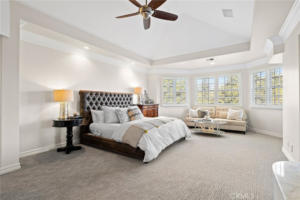 4 Percheron Coto de Caza, CA 92679 - Photo 16 of 44 a spacious bedroom with a bed and a large window