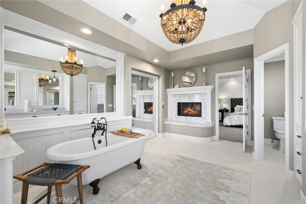 4 Percheron Coto de Caza, CA 92679 - Photo 19 of 44 a living room with furniture and a fireplace