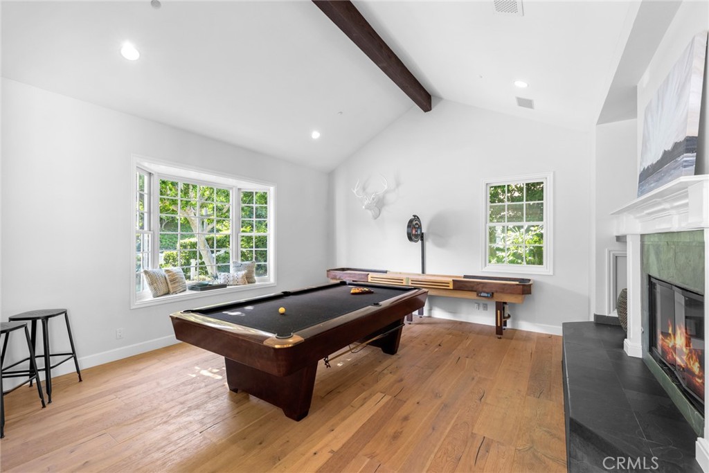 4 Percheron Coto de Caza, CA 92679 - Photo 5 of 44 a living room with a table chairs and a wooden floor