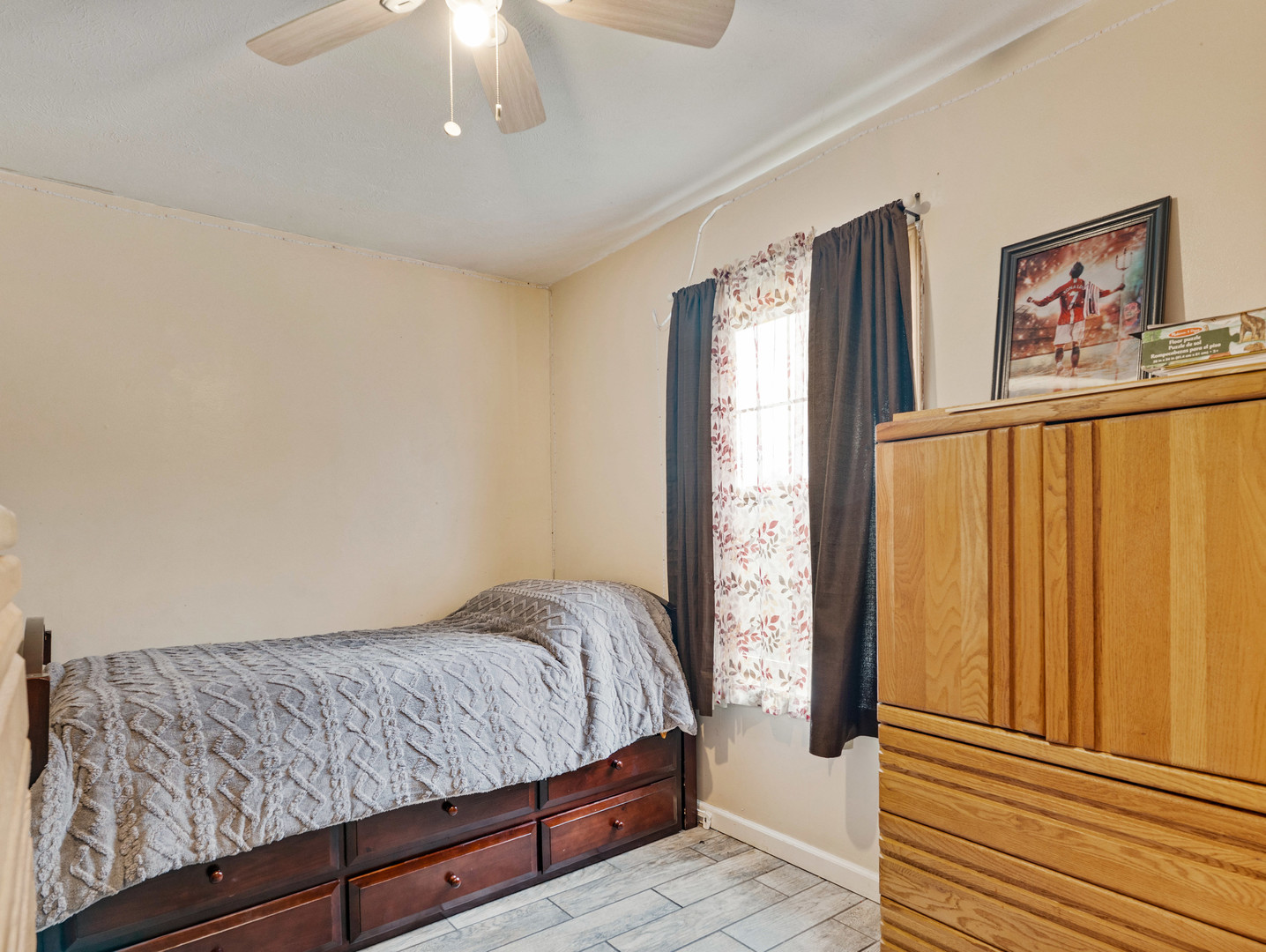 31 Peggy Drive Sandwich, IL 60548 - Photo 15 of 17 a bedroom with a bed and a chandelier