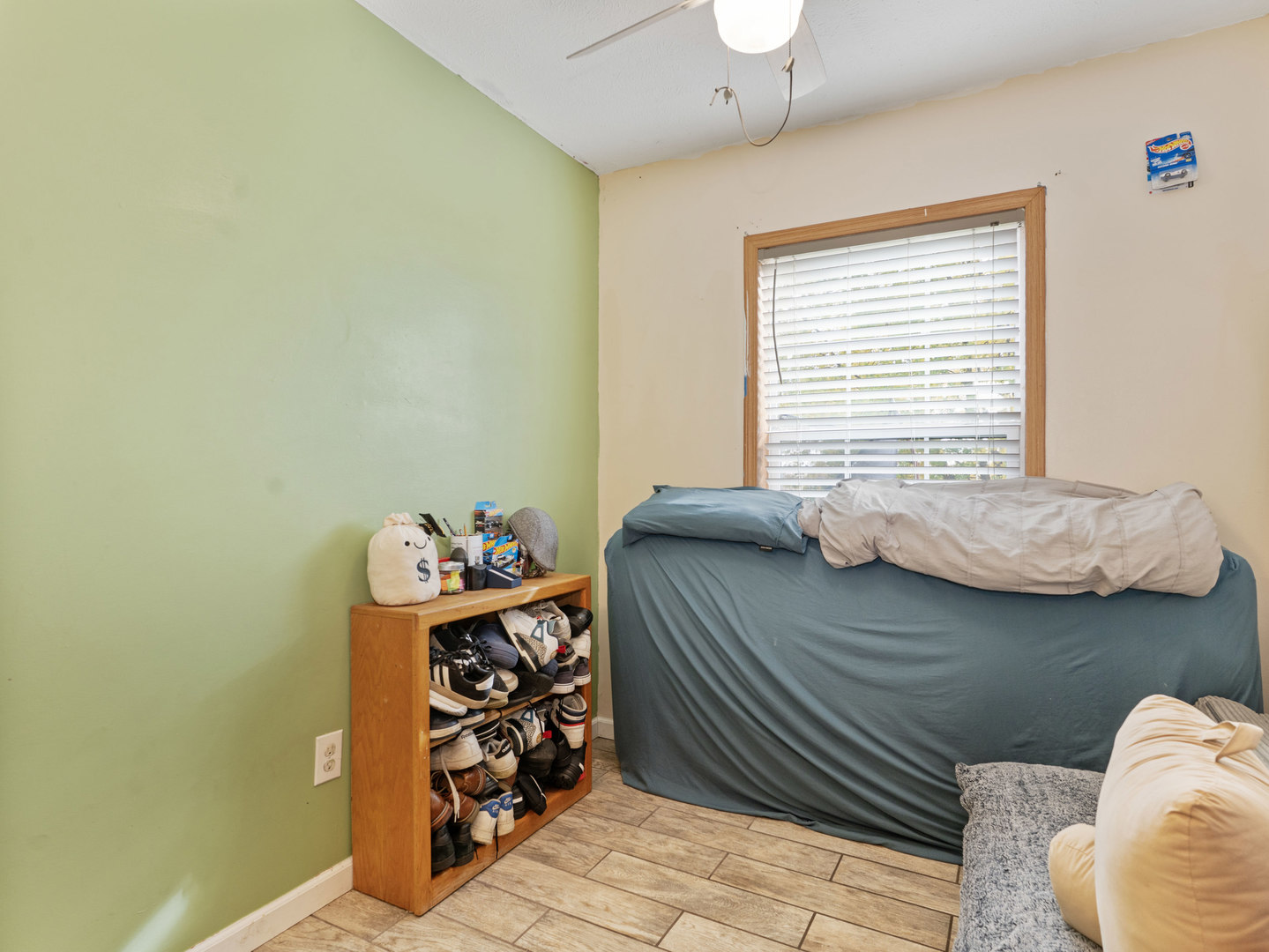 31 Peggy Drive Sandwich, IL 60548 - Photo 17 of 17 a bedroom with a bed and a window