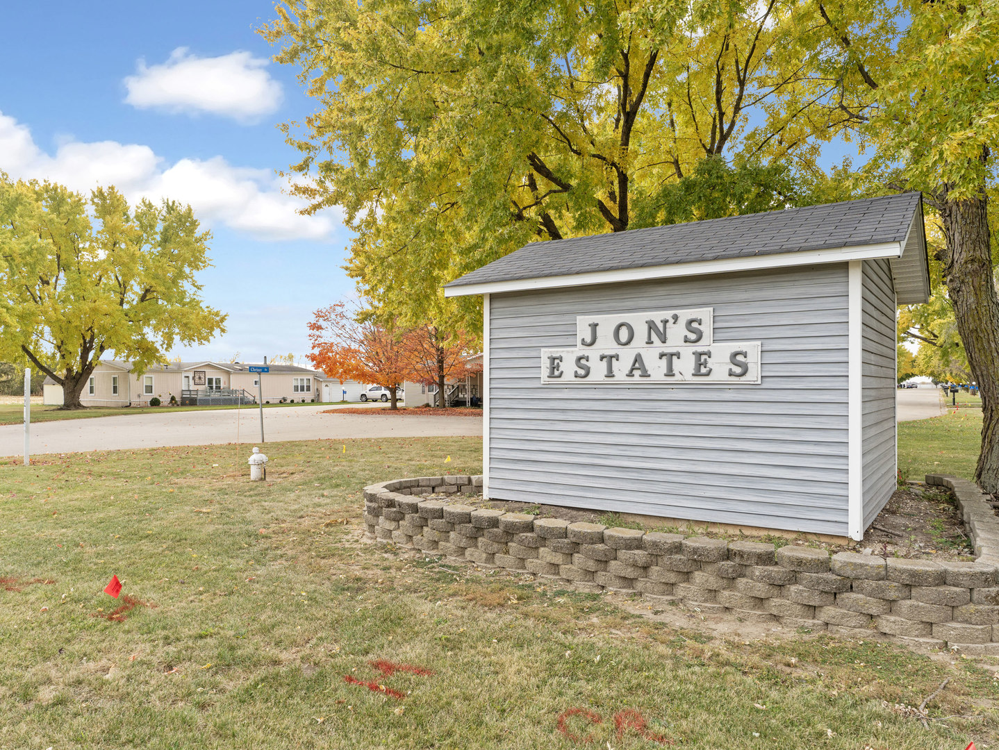 31 Peggy Drive Sandwich, IL 60548 - Photo 3 of 17 a sign board on the side of a road
