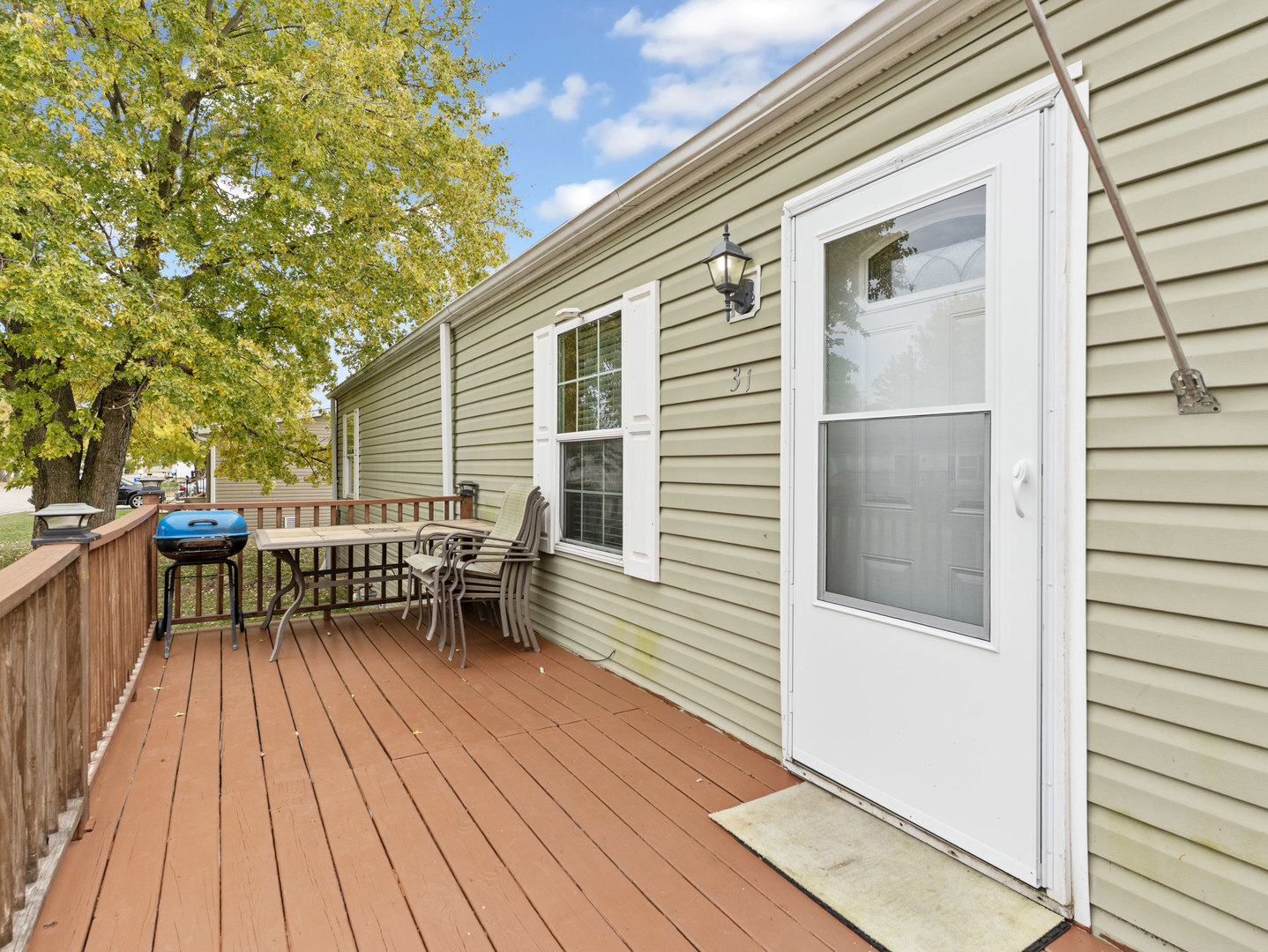 31 Peggy Drive Sandwich, IL 60548 - Photo 6 of 17 a view of a chairs on the deck
