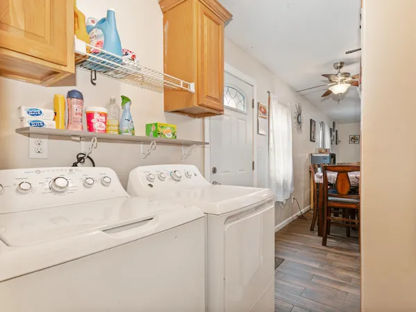 a utility room with dryer and washer