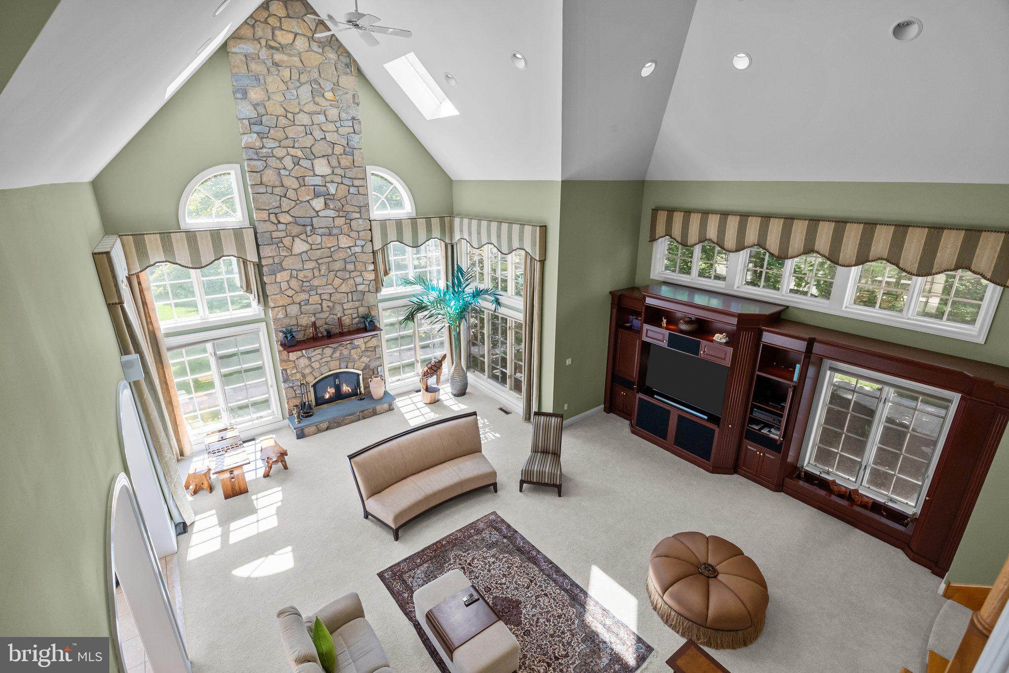 1049 McKean Road Ambler, PA 19002 - Photo 31 of 93 a living room with furniture and a floor to ceiling window