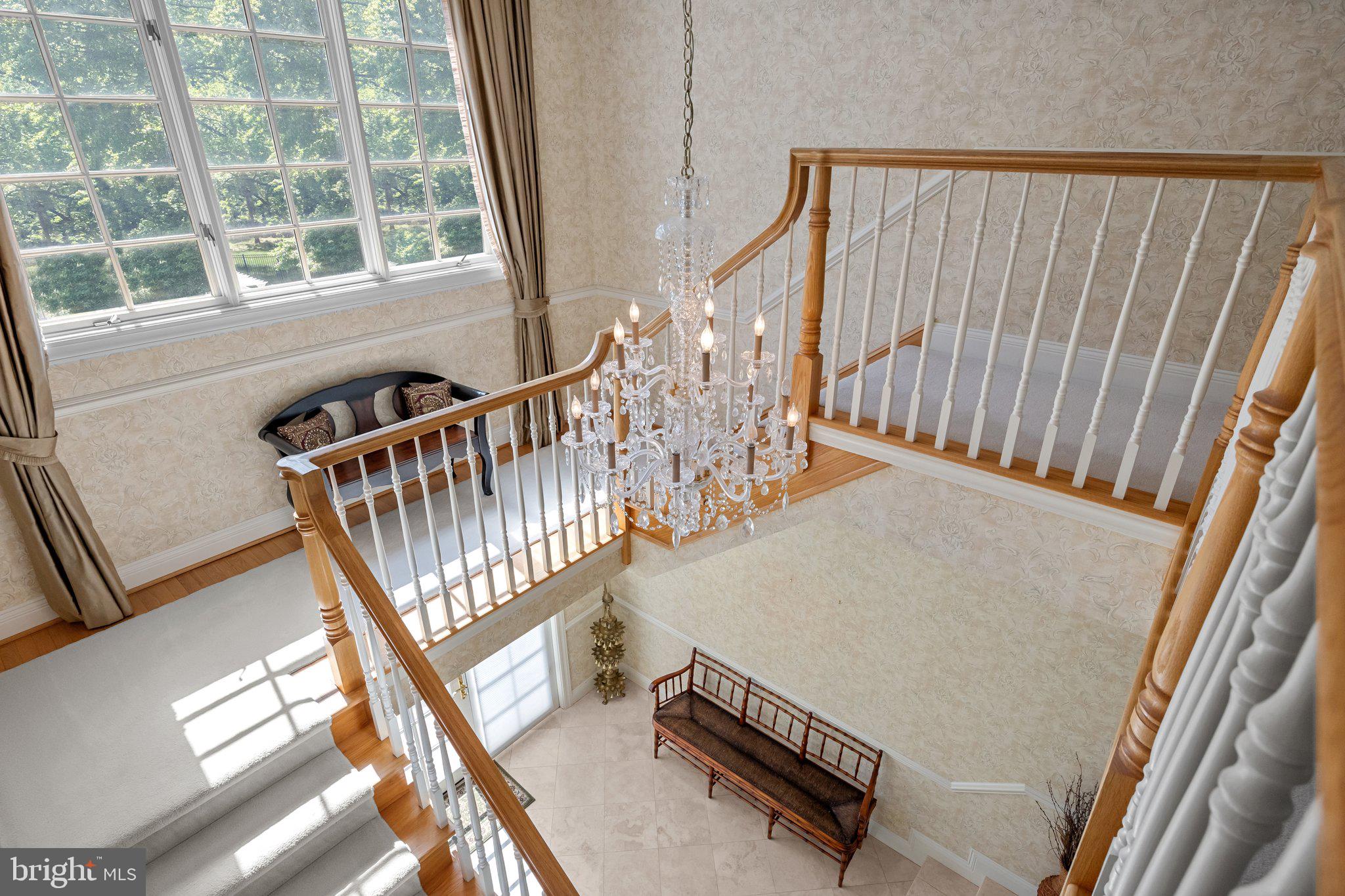 1049 McKean Road Ambler, PA 19002 - Photo 42 of 93 a view of staircase with wooden floor and a window