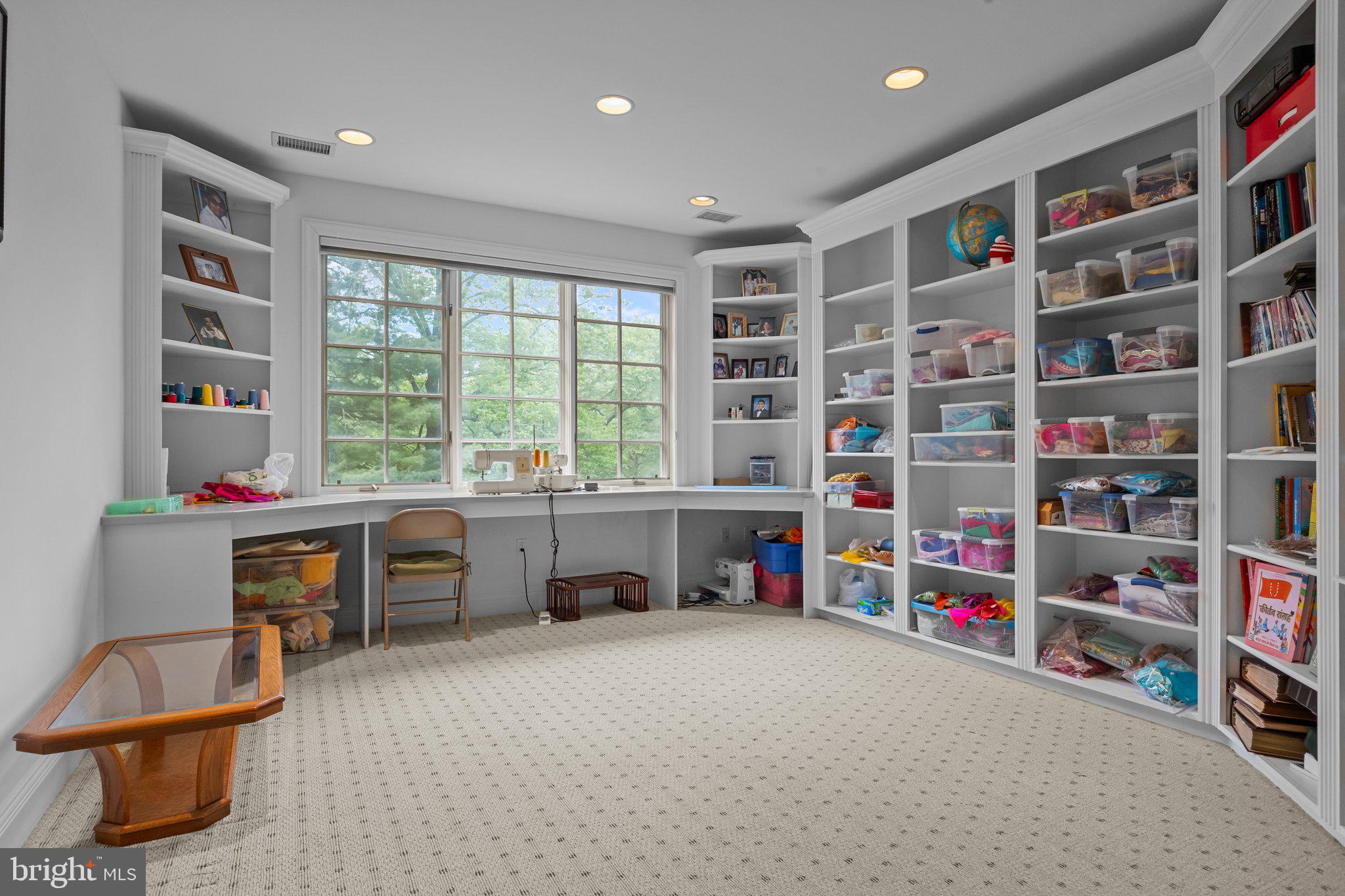 1049 McKean Road Ambler, PA 19002 - Photo 57 of 93 a view of a livingroom with furniture and a book shelf