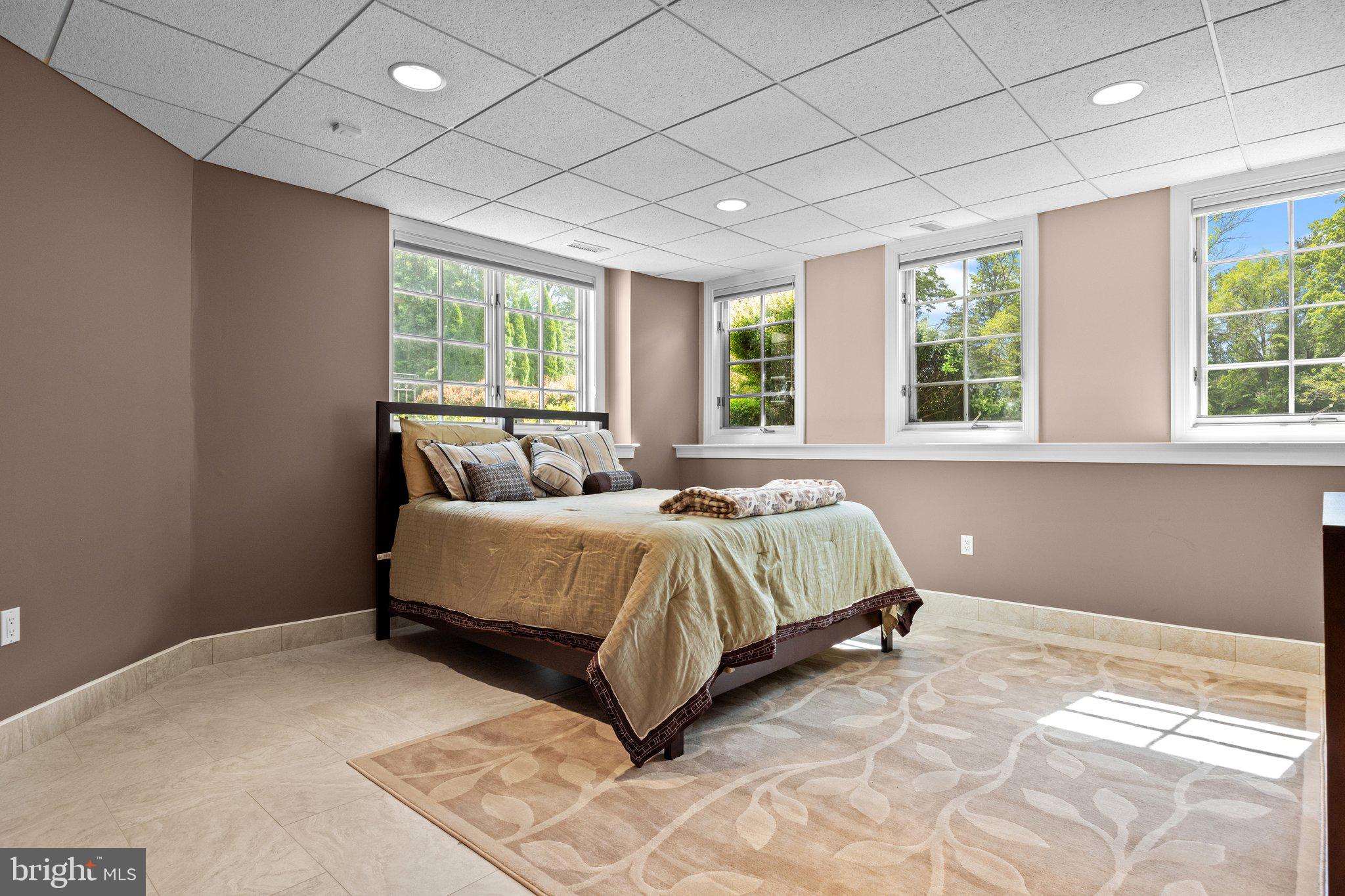 1049 McKean Road Ambler, PA 19002 - Photo 63 of 93 a bed sitting in a spacious bedroom next to a window