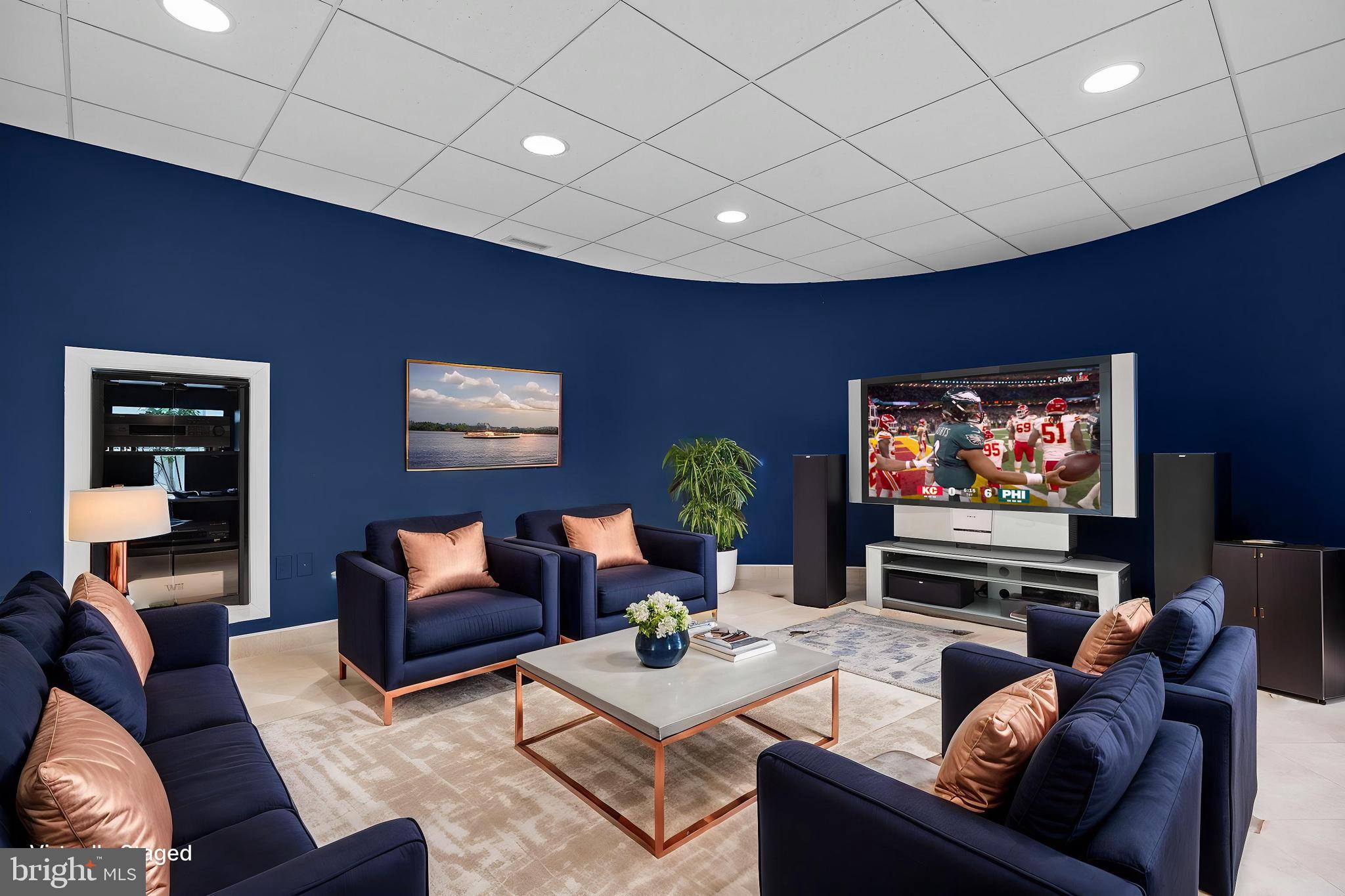 1049 McKean Road Ambler, PA 19002 - Photo 66 of 93 a living room with furniture and a flat screen tv
