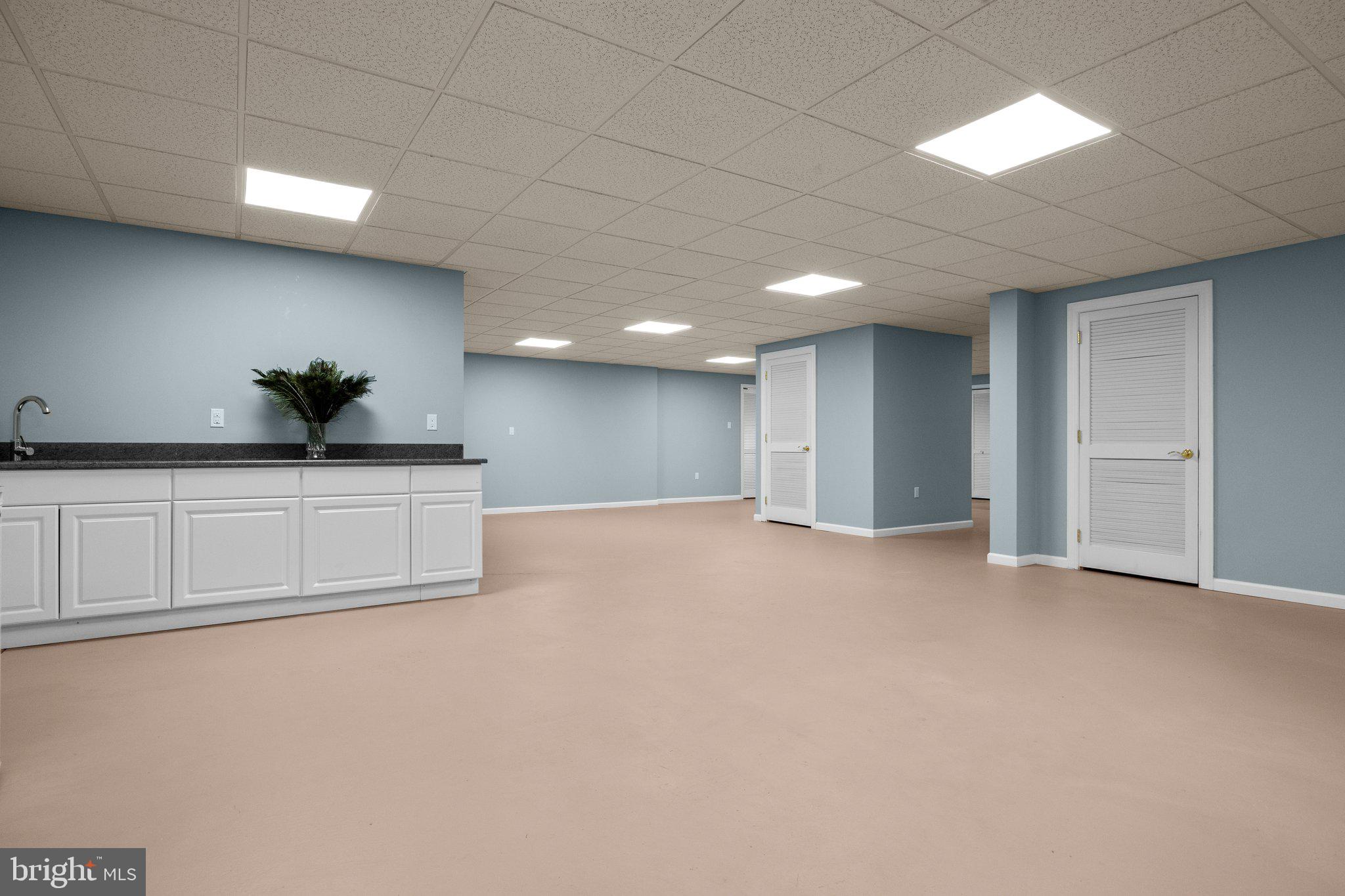 1049 McKean Road Ambler, PA 19002 - Photo 67 of 93 a living room with furniture and a potted plant