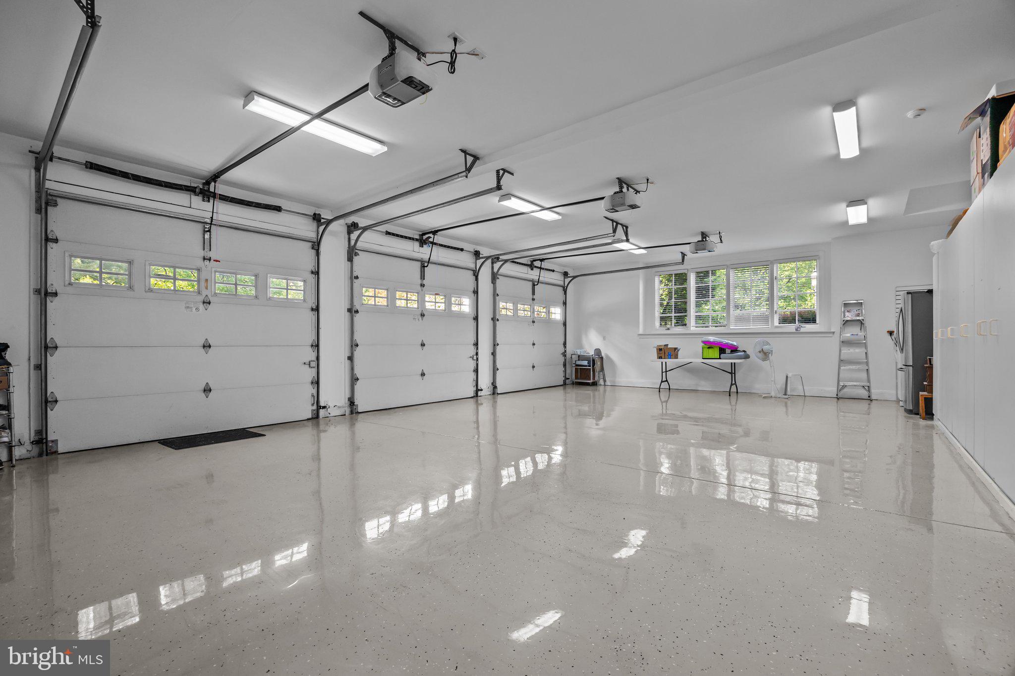 1049 McKean Road Ambler, PA 19002 - Photo 69 of 93 3-Car Attached Garage w/ Epoxy Floor & Half Bath